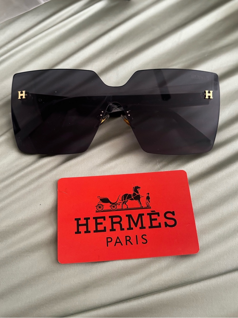 Hermès Women’s Oversized Shield Sunglasses in Black with Gold H Details - Picture 1 of 5